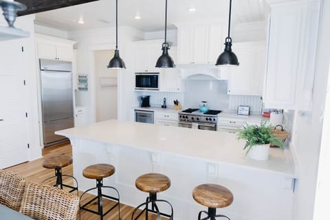 Kitchen. Seating for 12 if you take the office chair