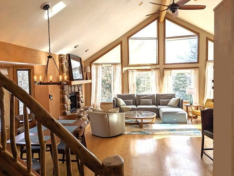 Light-filled Great Room: dining room, living room area and gourmet kitchen