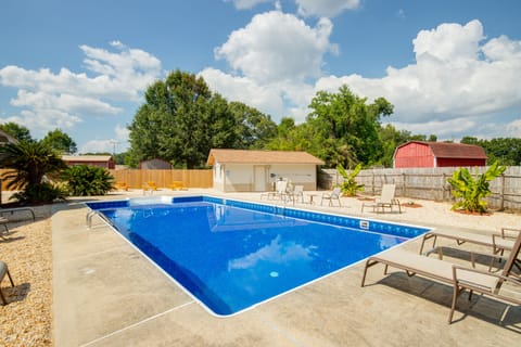 Pool with lounge chairs and gameroom
