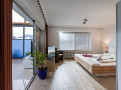 Maisonett-wohnung mit Küche, Wintergarten, 2 SZ - Blaiken Appartements Bed and Breakfast in Ellmau