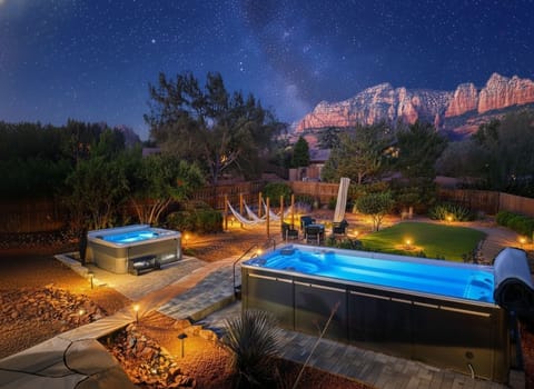 Huge backyard with amazing Red Rock views. Heated pool and spa with hammocks.