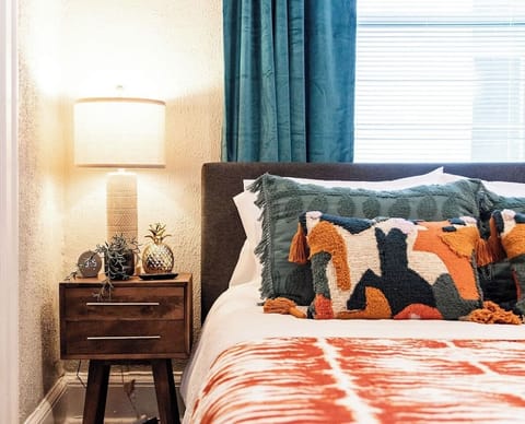 Charming bedside table with a sleek design, offering convenient storage for your essentials like a lamp, books, or your phone.