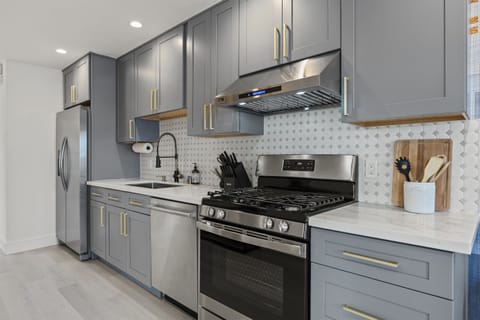 Stocked Kitchen with Plate and Utensils