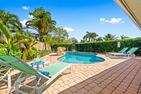 Amazing heated private pool with water fountain and loungers