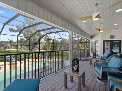 Lanai area overlooking pool and spa