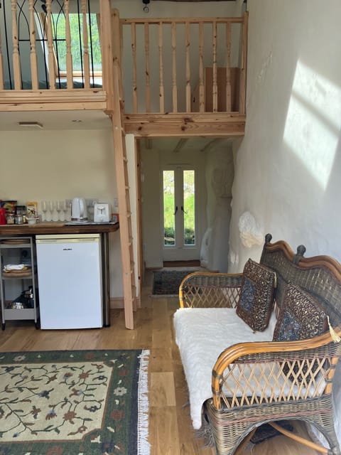 From the sitting room to the back hall and bedroom two access