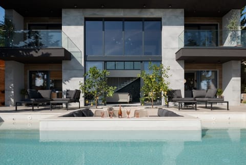 Outdoor seating area by the pool in Zadar luxury villa near the beach