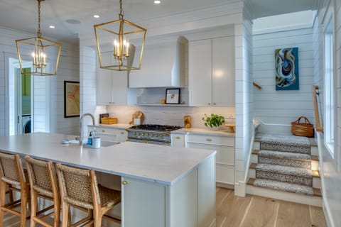 Kitchen island and stairs to 2nd floor