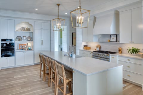Another view of kitchen with laundry in the background