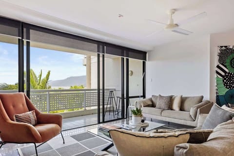 The living room opens straight to the balcony, creating a seamless transition between the indoors and out.  
