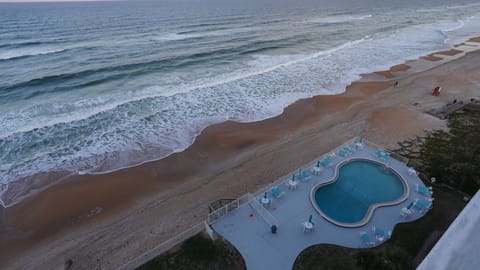 Beautiful view of the ocean and the pool from the unit.