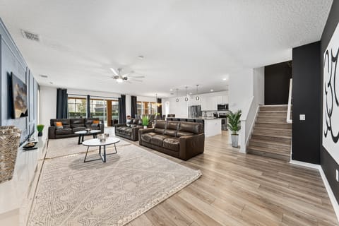 The house features open-concept spaces, perfect for enjoying with large groups of family and friends.