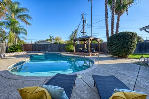 Fully fence backyard with private pool access by the guest during their stay. 