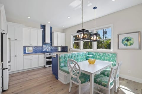 Gorgeous chef's kitchen with chic banquet