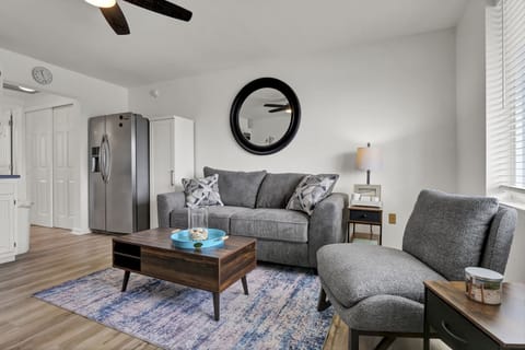 Tastefully decorated living room with pul out sofa