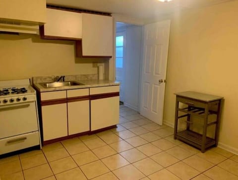 Downstairs kitchenette with microwave