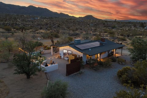 Desert oasis with solar-powered home, fire pit & sunset views