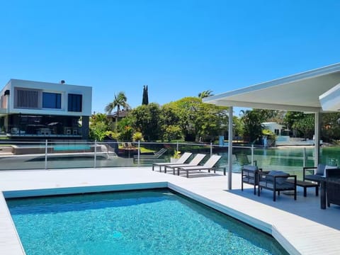 Private pool, heated spa, sun loungers, and timber deck create the perfect outdo