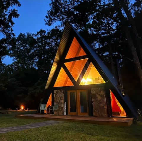 Spacious A-frame nestled within expansive grounds, offering abundant outdoor space