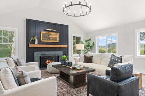 Surrounded by lush woods, this getaway offers a blend of serenity and style