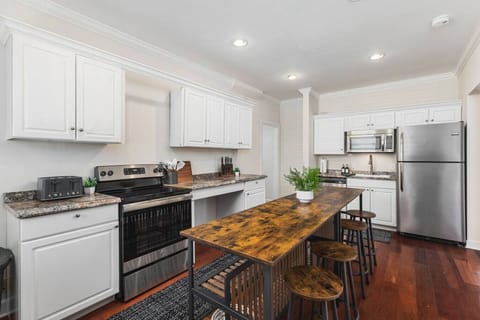 Fully-stocked kitchen with all the appliances & utensils you'd need to prepare a meal. Seating for four available at the counter.