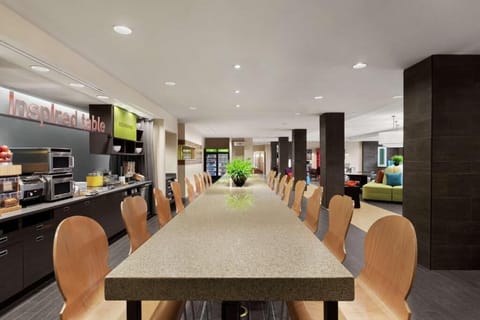 Share breakfast and plan the day at communal seating.