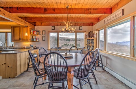 Dining room. Main floor. Dining table sits 8 people.