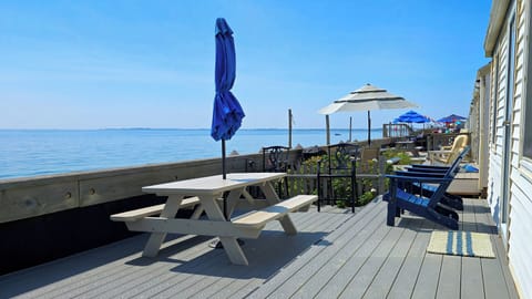 Exclusive-use deck with picnic table, gas grill and Adirondack chairs