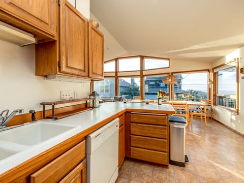 Fully equipped kitchen open to the dining room.