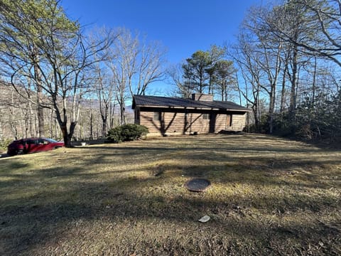 Front view of house. Park below but enter through the front. 