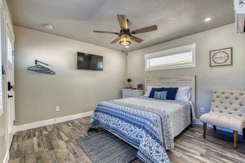 Comfortable, queen bed with a fresh farmhouse feel.