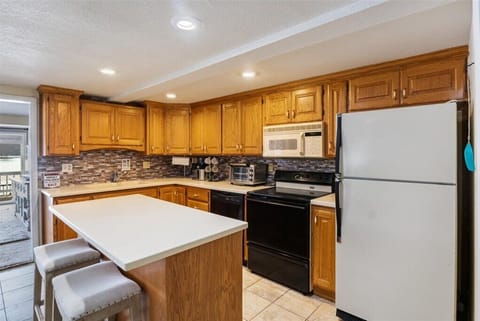 Downstairs kitchen is also fully stocked.
