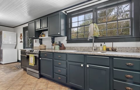 Look out onto the pool or into the majestic oaks