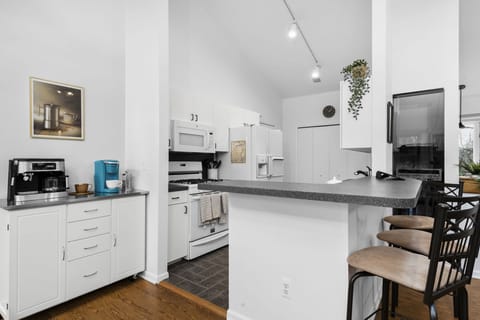 Kitchen with island and coffee bar