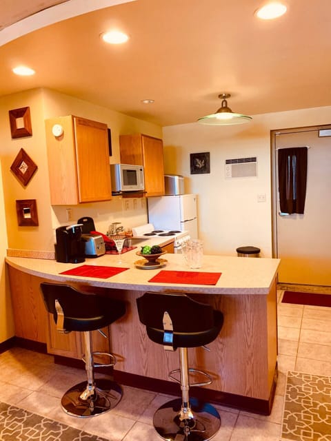 Kitchen area and entry door
