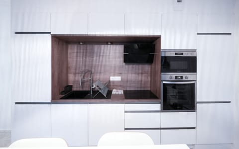 "Elegant White and Wood Kitchen"