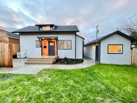 A warm welcome awaits at our new stylish home with detached 1 car garage.