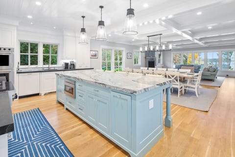 The kitchen boasts a large island and plenty of amenities 