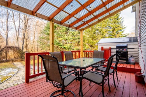 The private, back deck is covered and has dining furniture for six.