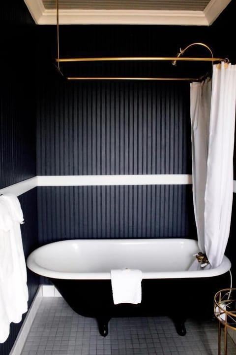 Soak blissfully in the vintage clawfoot tub after exploring.