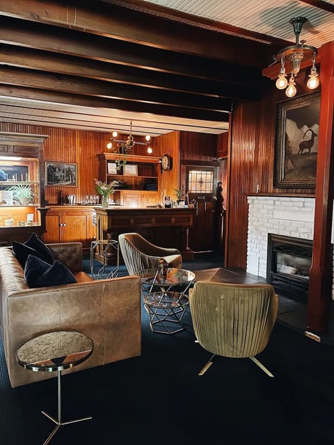 Gather fireside for cocktails in a richly styled lounge.