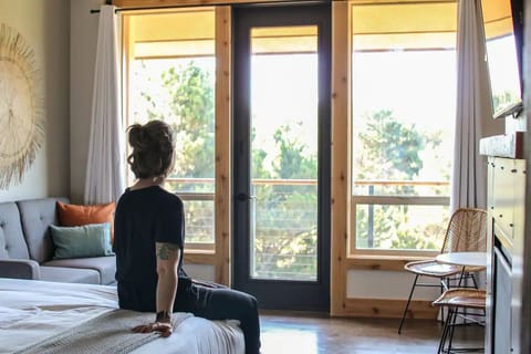 Picture yourself gazing out at the trees from bed.