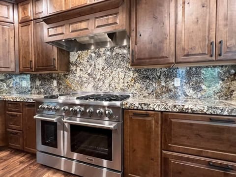 Beautiful Kitchen with six burner gas stove and double oven