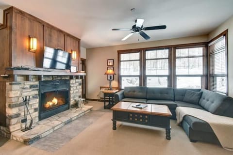 living room with wood fireplace