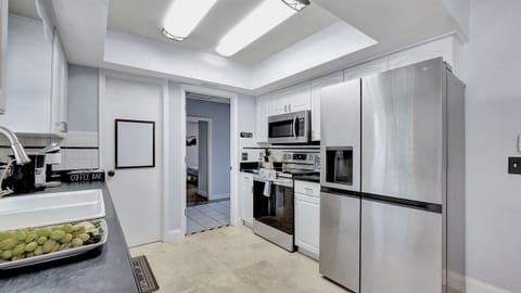This stylish space features modern appliances, and ample counter space.