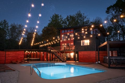 large 9ft deep pool with wrap around pool deck with lounge chair where you can sun bathe. There is man cave that you can sit in the shade, watch some TV, and watch the kiddos swim or you can relax in the hot tub nearby.