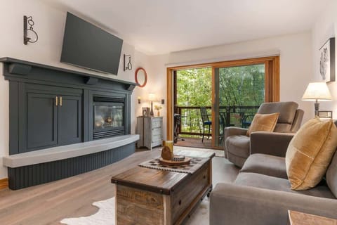 This renovated unit offers an upscale and tranquil retreat close to nature.