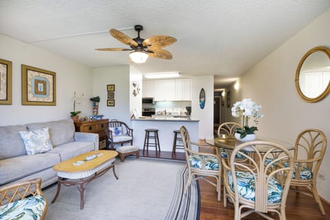 Living room area, is furnished and has an AC unit.