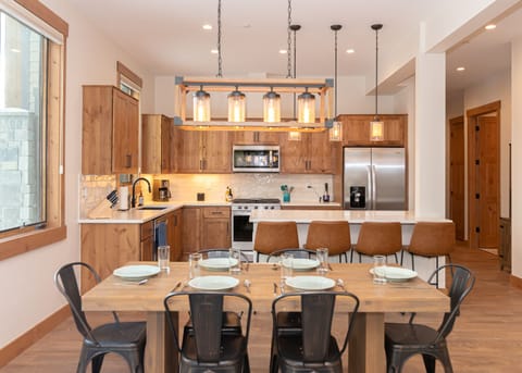 We have ample dining space at the table and island, plus a fully stocked kitchen