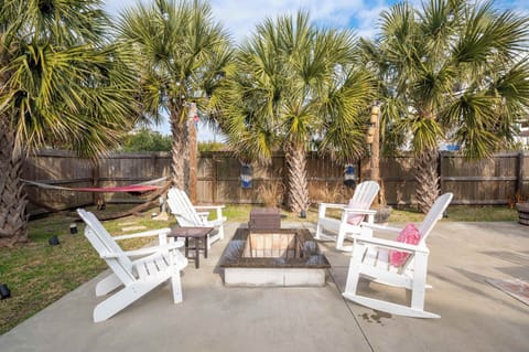 Fenced Backyard Oasis with fire Pit